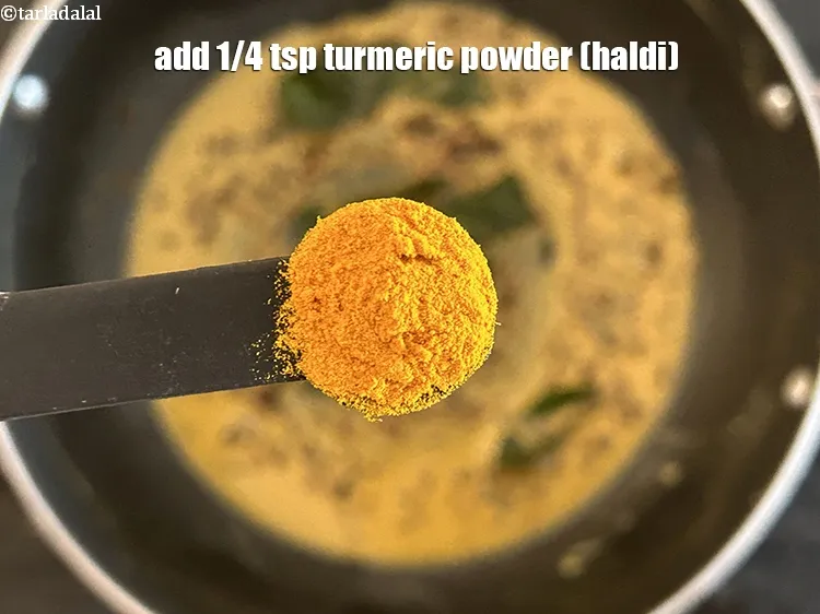 Step 18 – Add&nbsp;<meta charset="UTF-8" />1/4 tsp&nbsp;<a href="glossary-turmeric-powder-haldi-645i">turmeric powder (haldi)</a>.