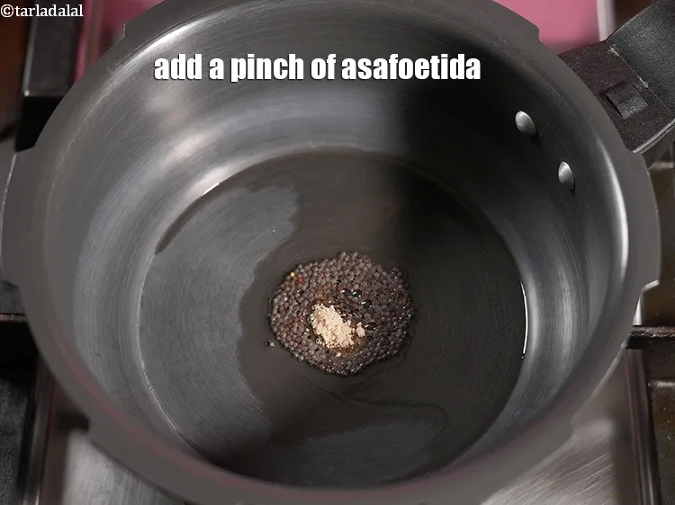 Step 18 – Add a pinch of asafoetida.&nbsp;