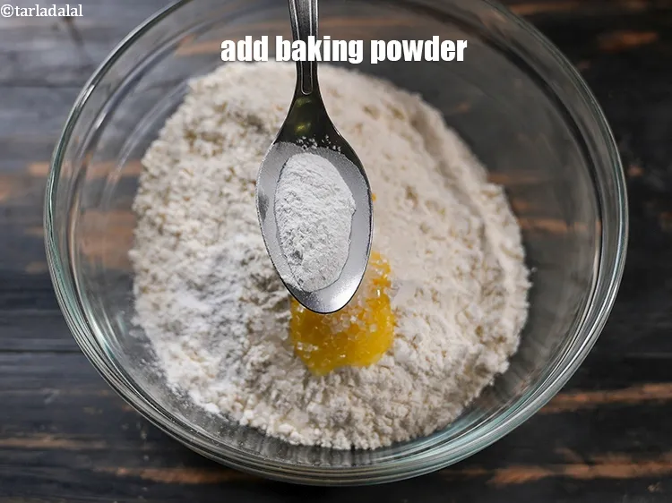 Step 18 – Add 1 tsp <a href="https://www.tarladalal.com/glossary-baking-powder-425i">baking powder</a>.