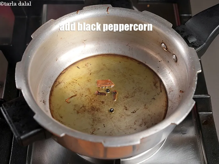 Step 18 – Add 2 black peppercorn.&nbsp;