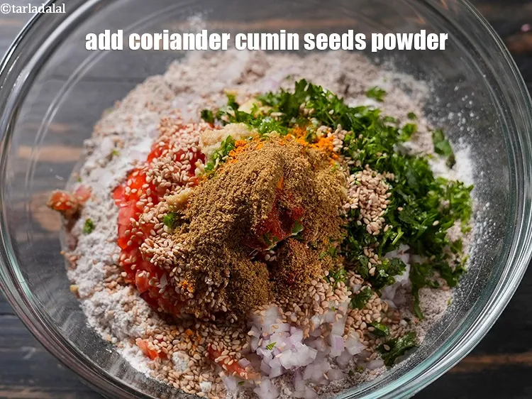 Step 18 – Add 1 tsp <a href="https://www.tarladalal.com/glossary-coriander-dhania-kothmir-369i">coriander (dhania)</a>&nbsp;<a href="https://www.tarladalal.com/glossary-cumin-seeds-powder-jeera-powder-zeera-powder-382i">cumin seeds (jeera) powder</a>.