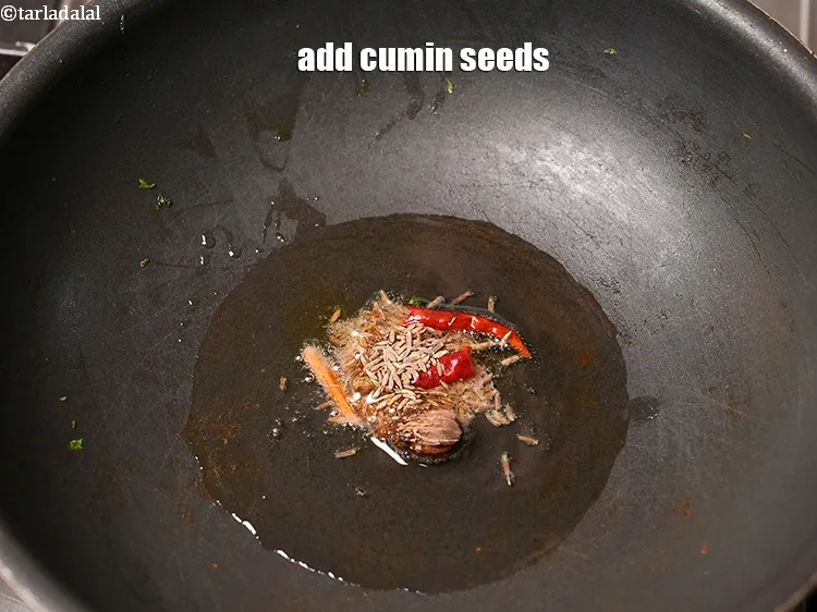 Step 18 – Add &frac12; tsp&nbsp;<a href="https://www.tarladalal.com/glossary-cumin-seeds-jeera-zeera-381i">cumin seeds (jeera)</a>.