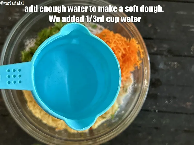 Step 17 – Add enough water to make a soft dough. We added 1/3rd cup&nbsp;water.