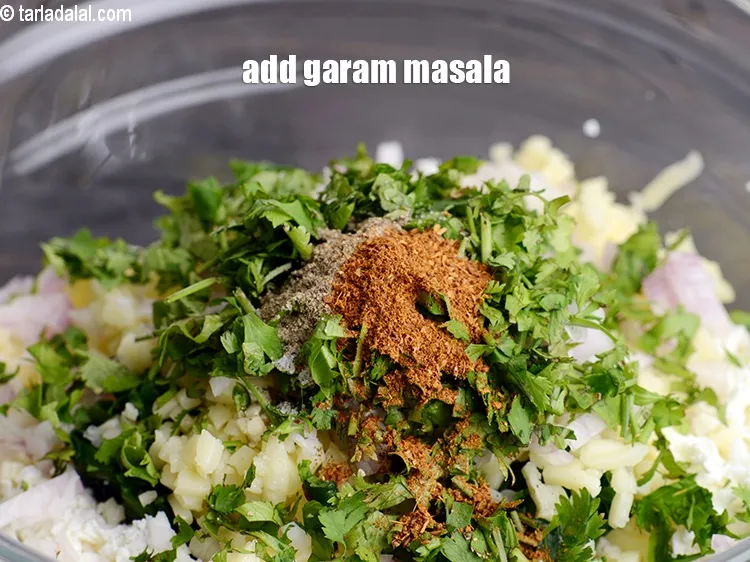 Step 20 – Add &frac14; tsp <a href="https://www.tarladalal.com/glossary-garam-masala-296i">garam masala</a>.