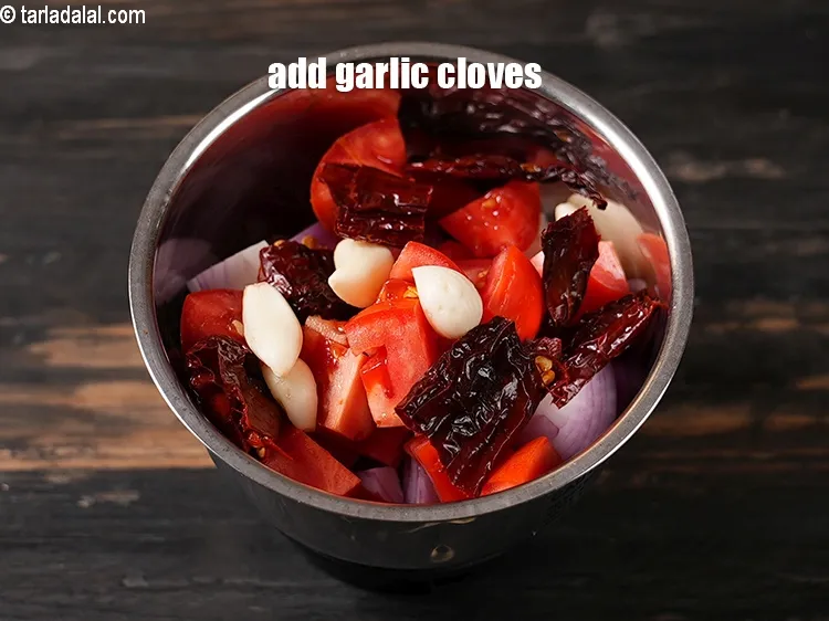 Step 18 – Add 5 garlic cloves.