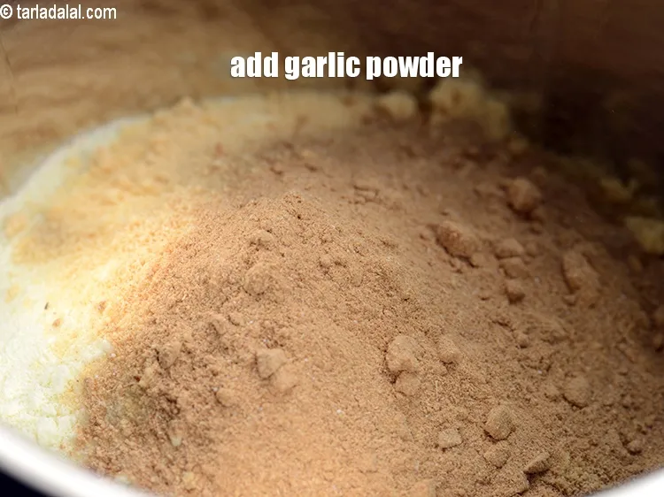 Step 18 – Add 2 tsp <a href="https://www.tarladalal.com/glossary-garlic-powder-lehsun-ka-powder-lahsun-ka-powder-351i">garlic (lehsun) powder</a>.