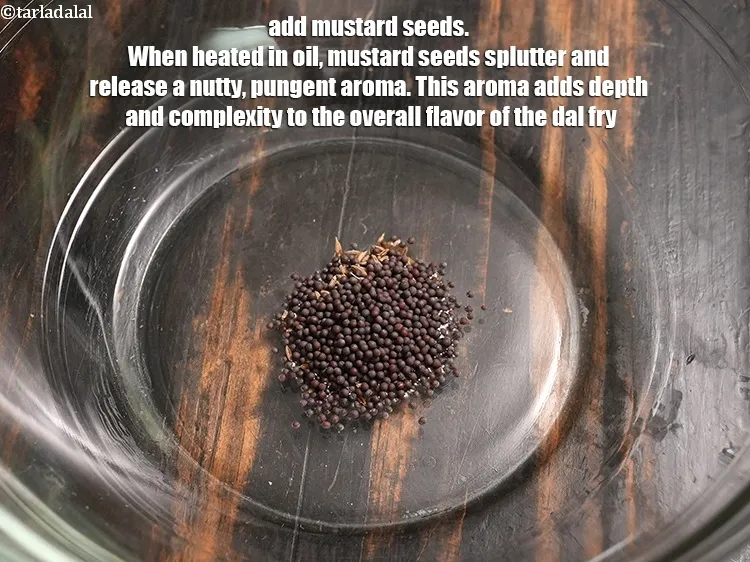 Step 18 – Add &frac12; tsp <a href="https://www.tarladalal.com/glossary-mustard-seeds-sarson-rai-sarson-ke-beej-525i">mustard seeds ( rai / sarson)</a>. When heated in oil, mustard …