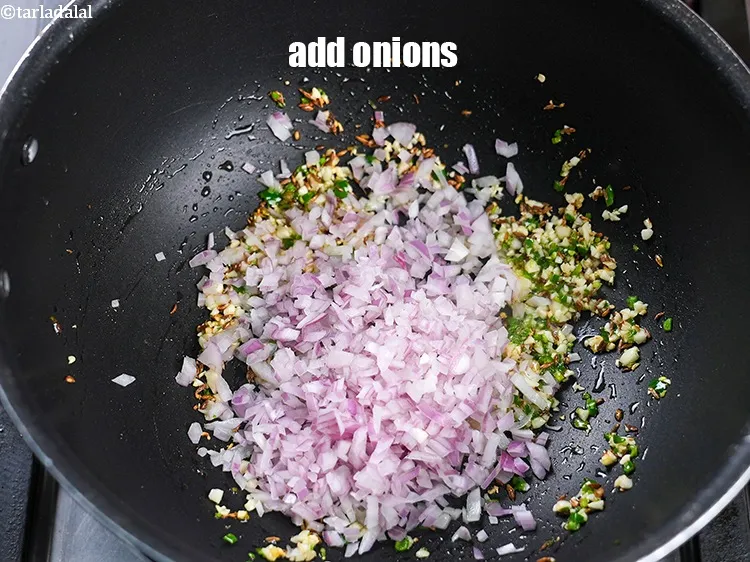 Step 18 – Add &frac12; cup finely&nbsp;<a href="https://www.tarladalal.com/glossary-chopped-onions-722i">chopped onions</a>.&nbsp;