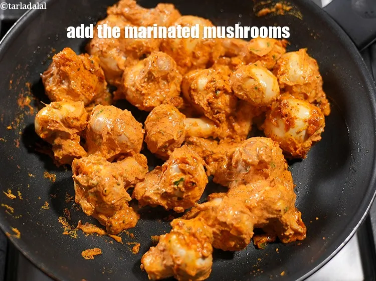 Step 18 – Add the marinated mushrooms.