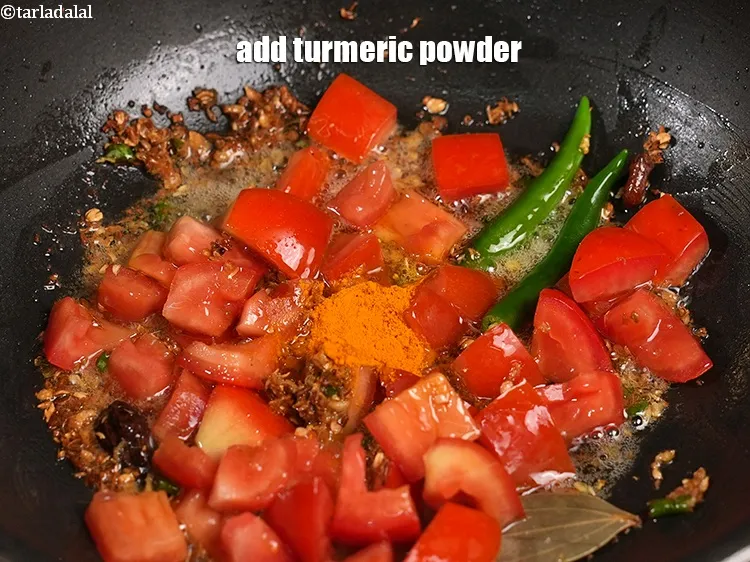 Step 18 – Add &frac12; tsp <a href="https://www.tarladalal.com/glossary-turmeric-powder-haldi-645i">turmeric powder (haldi)</a>.