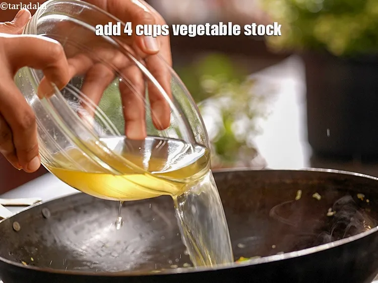 Step 18 – Add&nbsp;4 cups&nbsp;<a href="https://www.tarladalal.com/vegetable-stock-4181r">vegetable stock</a>.