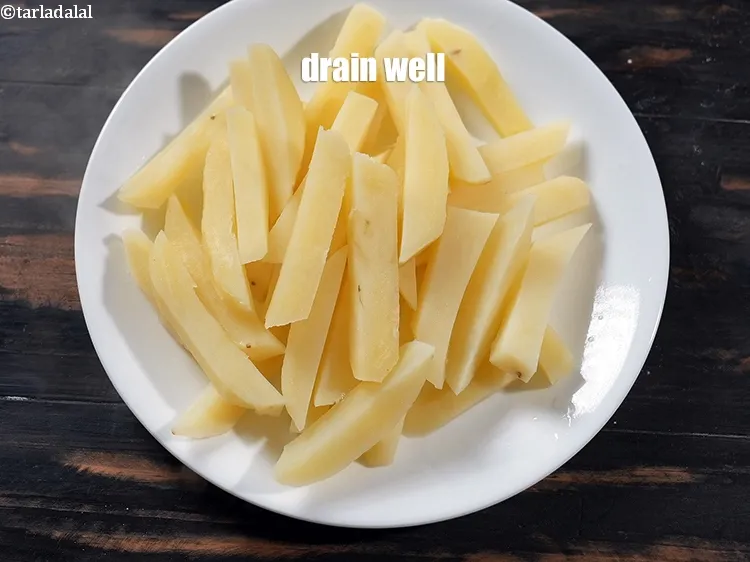 Step 18 – Drain the excess water and keep aside.