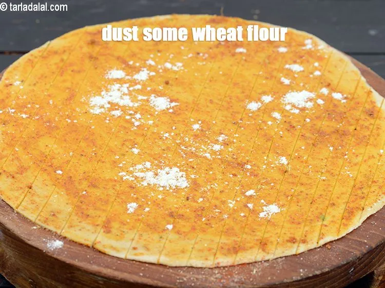 Step 18 – Dust some wheat flour over it.