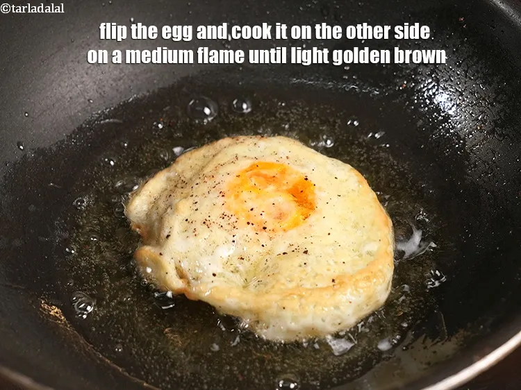 Step 18 – Flip the egg and cook it on the other side on a medium flame until …