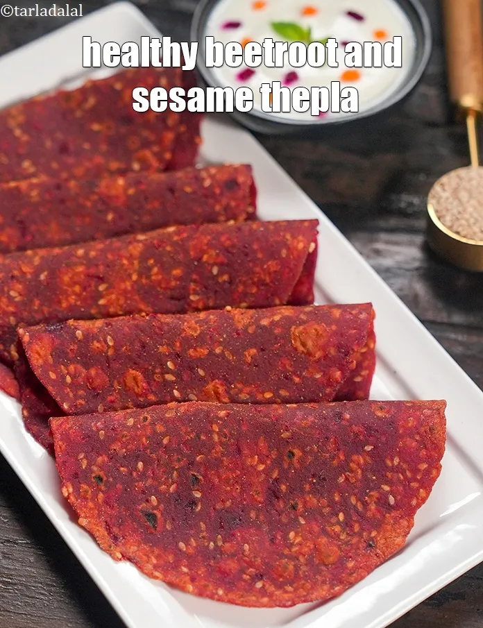 Step 18 – Serve<strong> beetroot and sesame roti recipe&nbsp;|&nbsp;healthy beetroot and sesame thepla&nbsp;|&nbsp;beetroot paratha &ndash; healthy breakfast&nbsp;|</strong> hot.