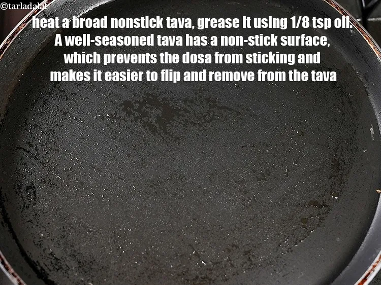Step 19 – To make <strong>millet dosa recipe | healthy kodri dosa | foxtail millet podi dosa |&nbsp;</strong>heat …