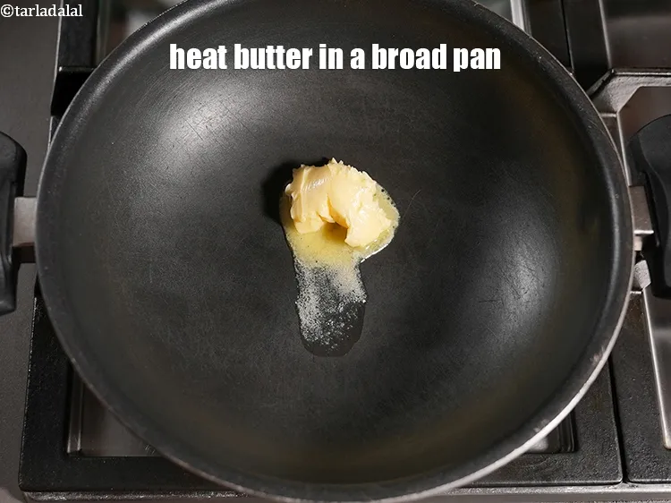 Step 19 – Heat 2 tbsp <a href="https://www.tarladalal.com/glossary-butter-makhan-233i">butter</a> in a broad pan.