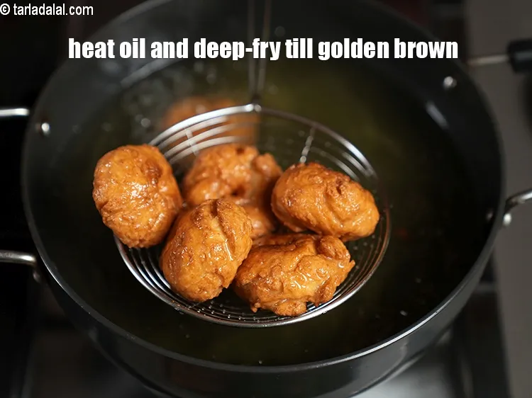 Step 18 – Heat the oil in a deep non-stick pan, deep-fry a few pieces at a time …