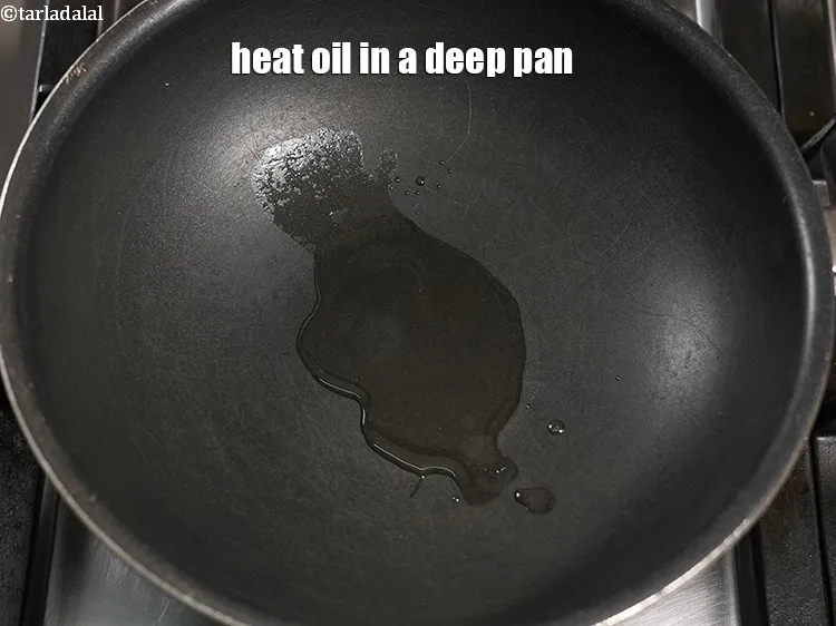 Step 19 – Heat 1 tsp oil in a deep pan.
