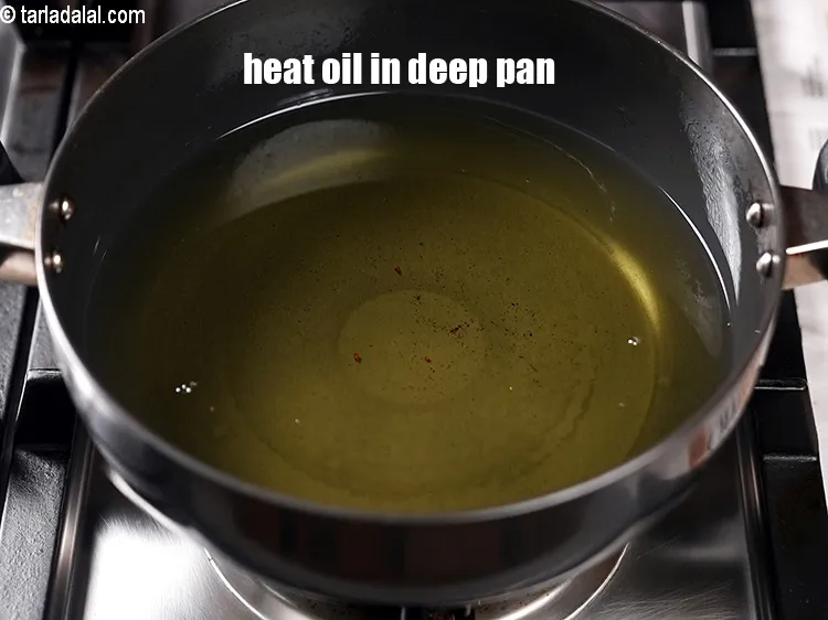Step 19 – Heat oil in a deep pan.