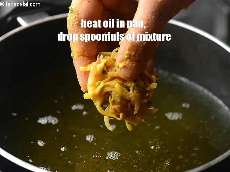 Step 18 – Heat oil in a deep pan, drop spoonfuls of the mixture in the oil.