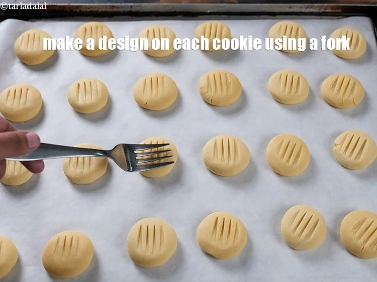 Step 18 – Make a design on each cookie using a fork.
