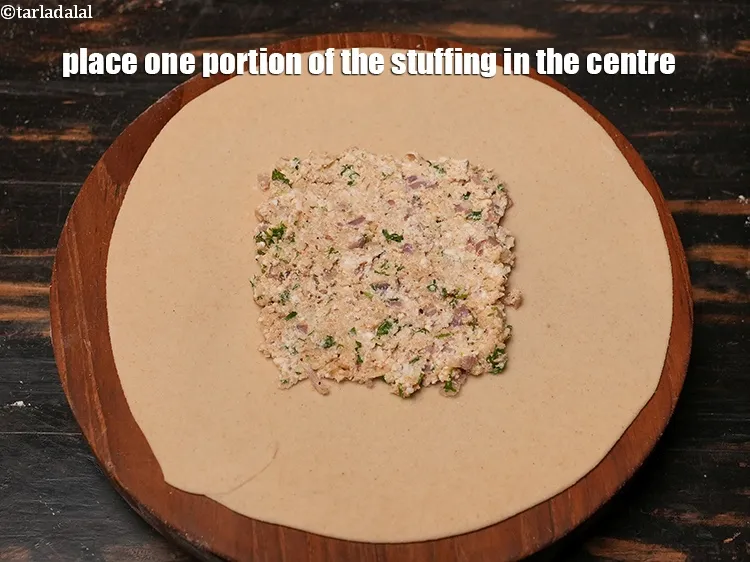 Step 26 – Place one portion of the stuffing in the centre.