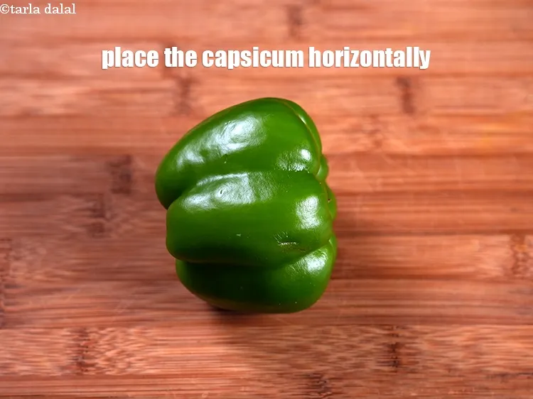 Step 18 – Place the capsicum horizontally on a chopping board.