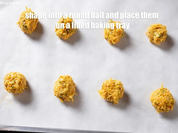 Step 18 – Shape each portion into a round ball and place them on a lined baking tray.