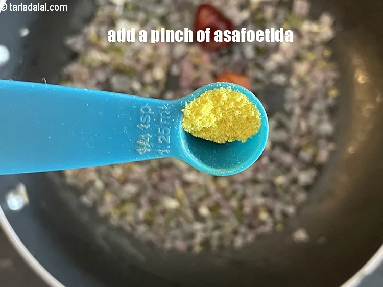 Step 31 – Add&nbsp;<meta charset="UTF-8" />a pinch&nbsp;<a href="glossary-asafoetida-hing-113i">asafoetida (hing)</a>.