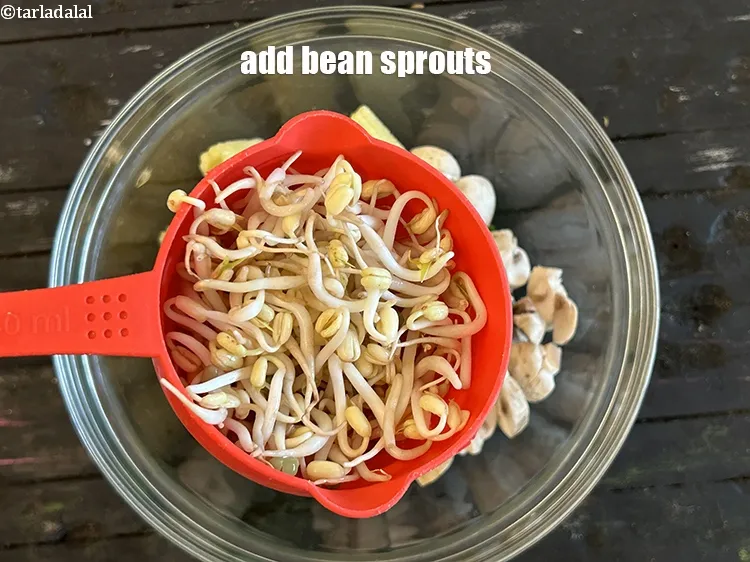 Step 25 – Add&nbsp;3/4 cup&nbsp;<a href="glossary-bean-sprouts-193i">bean sprouts</a>.