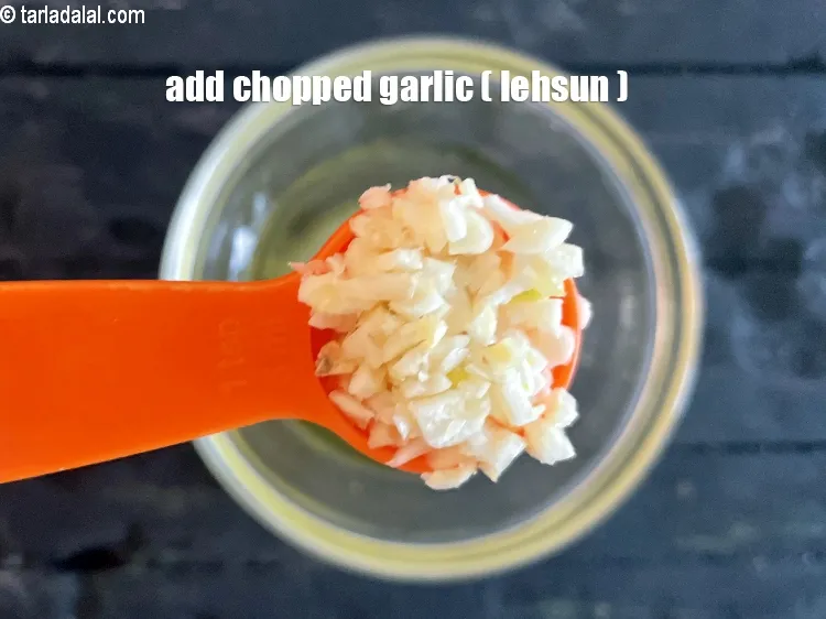 Step 18 – Add&nbsp;<meta charset="UTF-8" />1 tsp&nbsp;<a href="glossary-chopped-garlic-790i">chopped garlic (lehsun)</a>.