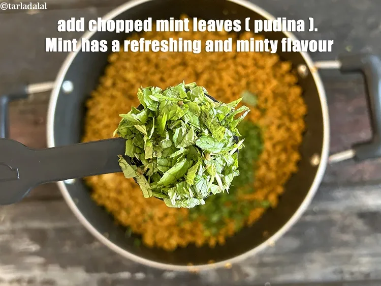 Step 23 – Add&nbsp;<meta charset="UTF-8" />1 tbsp&nbsp;finely&nbsp;<a href="glossary-chopped-mint-788i">chopped mint leaves (phudina)</a>.