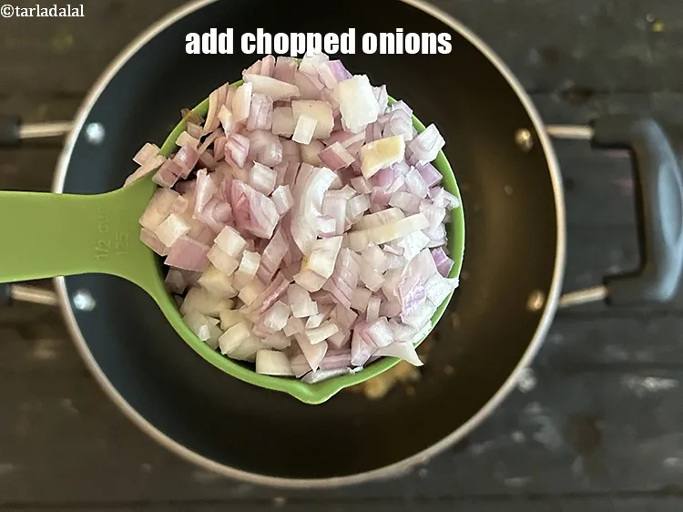 Step 24 – Add&nbsp;<meta charset="UTF-8" />1/2 cup&nbsp;<a href="glossary-chopped-onions-722i">chopped onions</a>.
