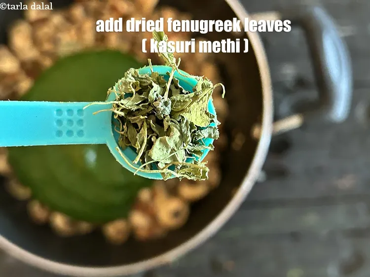 Step 25 – Add&nbsp;<meta charset="UTF-8" />1/2 tsp&nbsp;<a href="glossary-dried-fenugreek-leaves-kasuri-methi-374i">dried fenugreek leaves (kasuri methi)</a>.