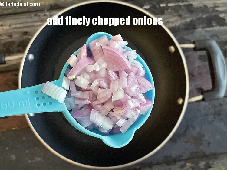 Step 25 – <html><head></head><body><p>Add 1/2&nbsp;cup&nbsp;finely&nbsp;<a href="glossary-chopped-onions-722i">chopped onions</a>.</p></body></html>
