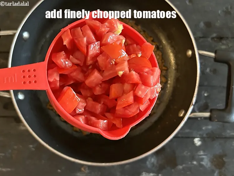 Step 26 – Add&nbsp;<meta charset="UTF-8" />1 cup&nbsp;finely&nbsp;<a href="glossary-chopped-tomatoes-779i">chopped tomatoes</a>.