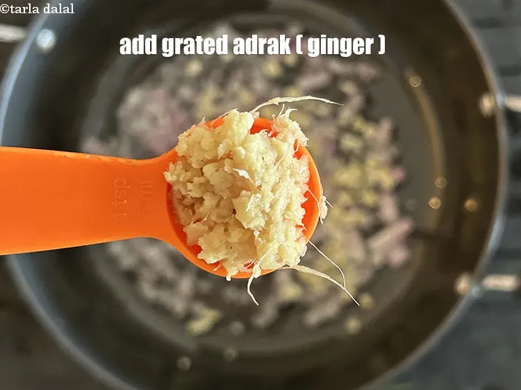 Step 19 – Add&nbsp;1 teaspoon grated ginger (adrak).