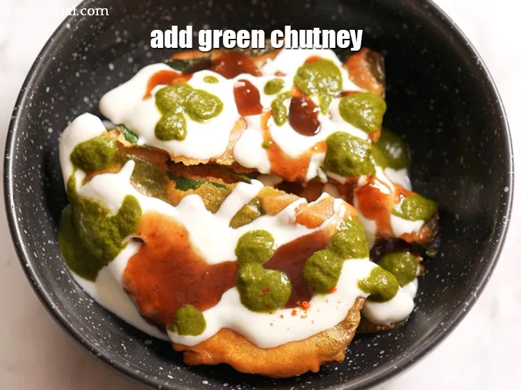 Step 18 – Add 2 tsp of <a href="https://tarladalal.com/green-chutney-22266r">green chutney</a>&nbsp;evenly over it.&nbsp;