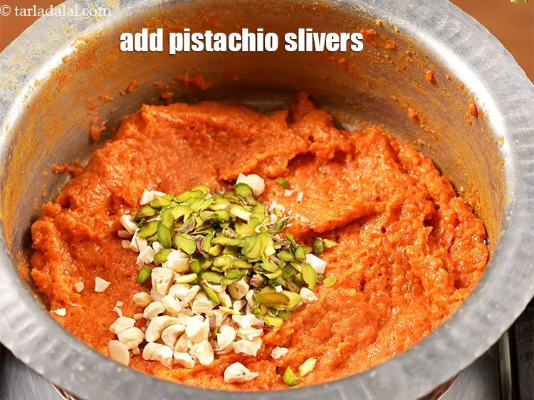 Step 18 – Add 1 tbsp <a href="https://www.tarladalal.com/glossary-pistachio-slivers-894i">pistachio slivers</a>.&nbsp;