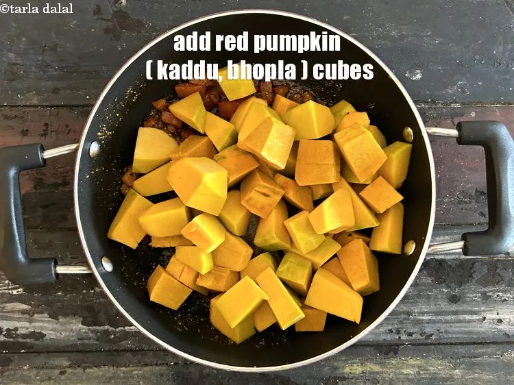 Step 18 – Add 3&nbsp;cups&nbsp;<a href="glossary-red-pumpkin-cubes-1530i">red pumpkin (bhopla / kaddu) cubes</a>.
