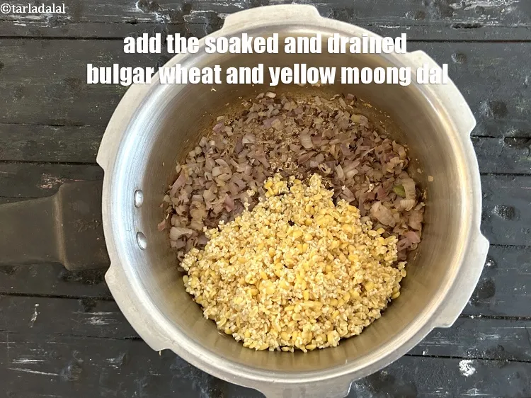 Step 20 – <p>Add the soaked bulgur wheat, yellow moong dal,&nbsp;</p>
