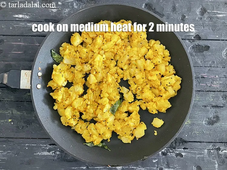 Step 61 – Cook on a medium flame for 2 minutes.