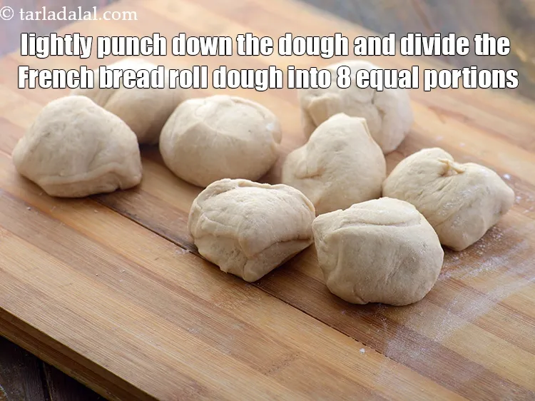 Step 16 – Lightly punch down the dough and divide the French bread roll dough into 8 equal …