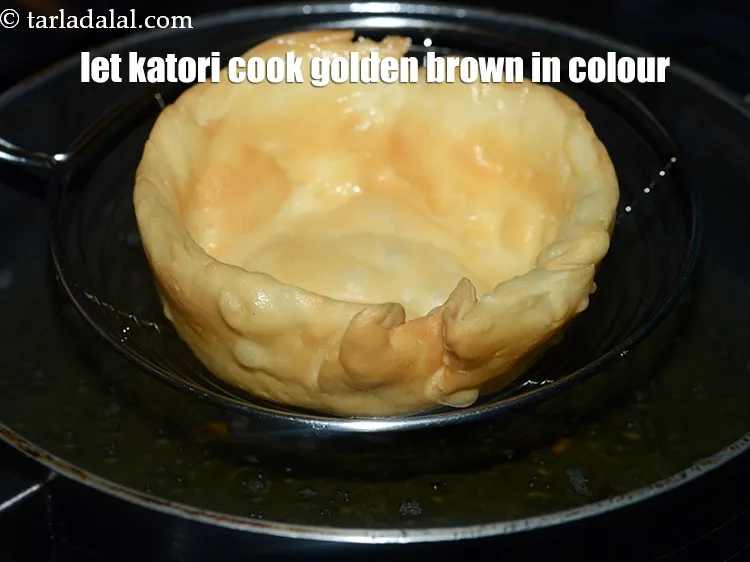 Step 20 – Let the katori cook till it is golden brown in colour form both the sides.