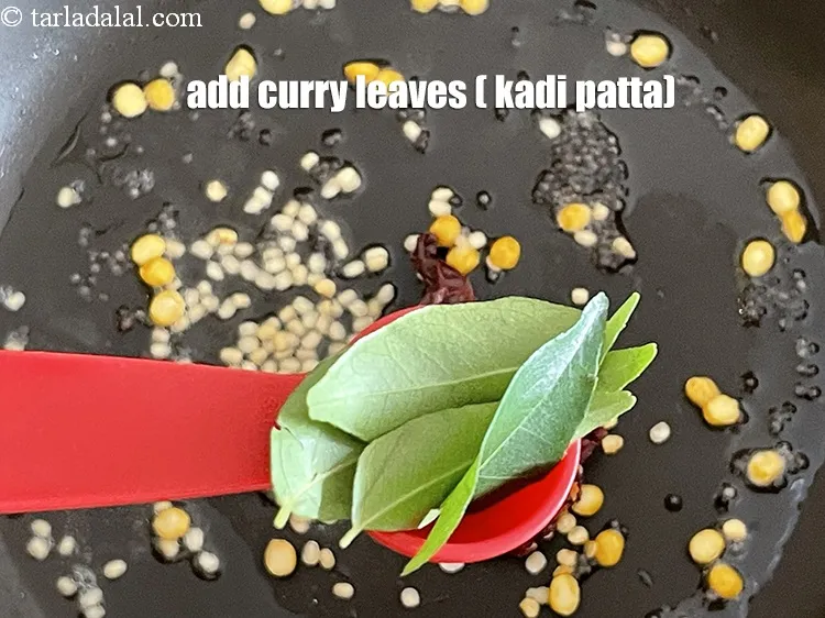 Step 18 – Add&nbsp;<meta charset="UTF-8" />14 to 16&nbsp;<a href="glossary-curry-leaves-kadi-patta-kadipatta-388i">curry leaves (kadi patta)</a>.