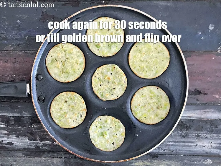 Step 30 – Cook again till golden brown and flip over. Your uttapam is ready.