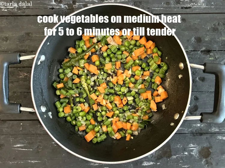 Step 24 – <p>Cook vegetables on medium flame for 5 to 6 minutes or&nbsp;till&nbsp;tender.</p>