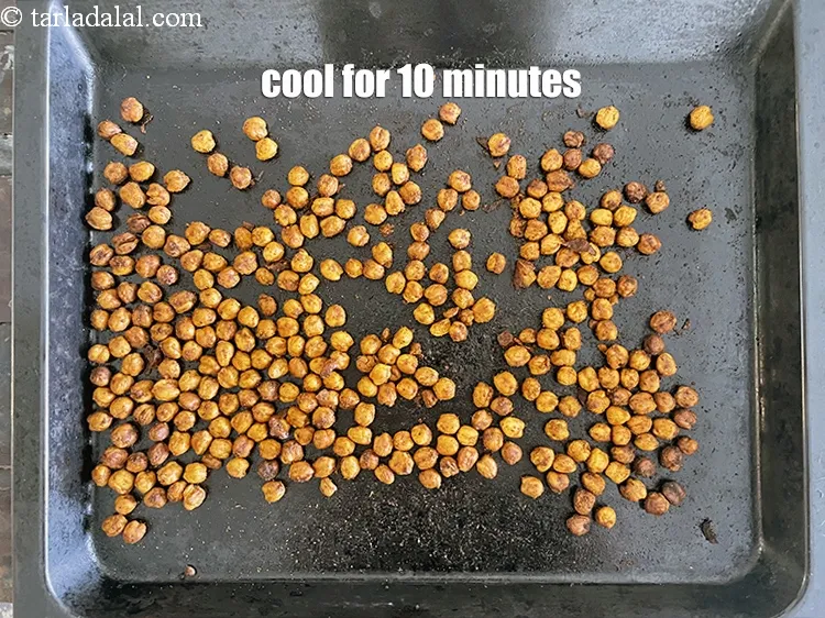 Step 29 – Cool <strong>baked masala chickpeas | oven made crispy kabuli chana | &nbsp;</strong>for 10 minutes.<u><em> This …