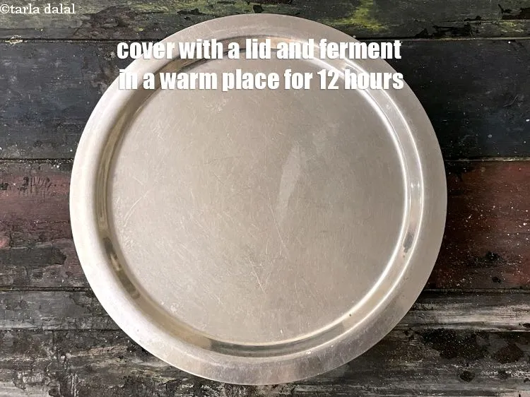Step 19 – Cover with a lid and keep aside to ferment the batter in a warm place …